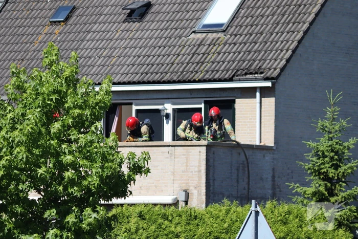 Brand op bovenste verdieping van hoekwoning