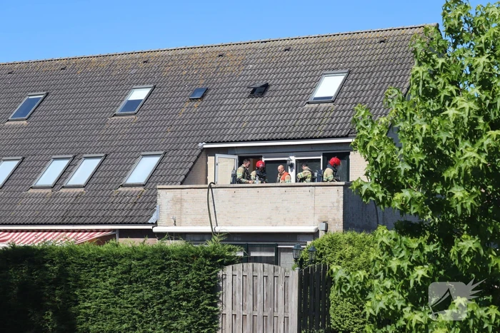 Brand op bovenste verdieping van hoekwoning