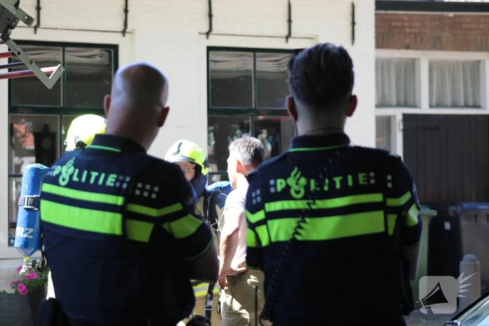 Brand in schuur tussen twee woningen
