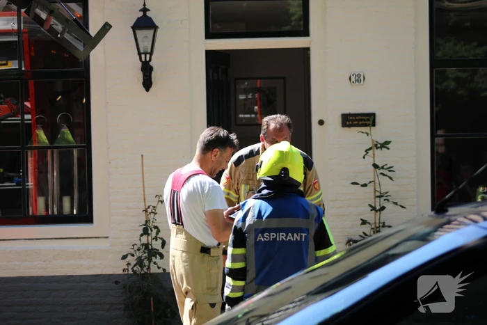Brand in schuur tussen twee woningen