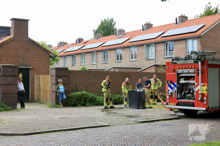 Ondergrondse container in brand