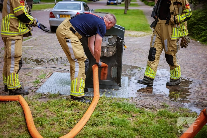 Ondergrondse container in brand