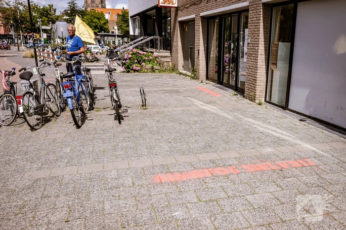 Actievoerders Extinction Rebellion demonstreren voor ING Bank
