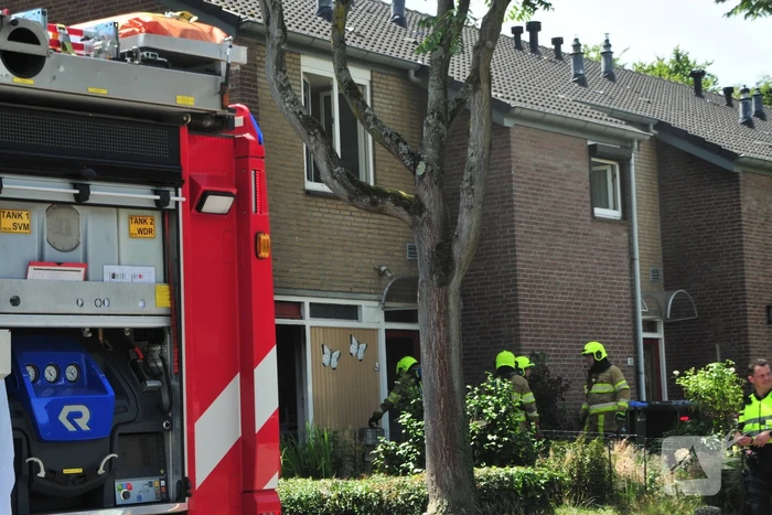 Rook bij brand in woning