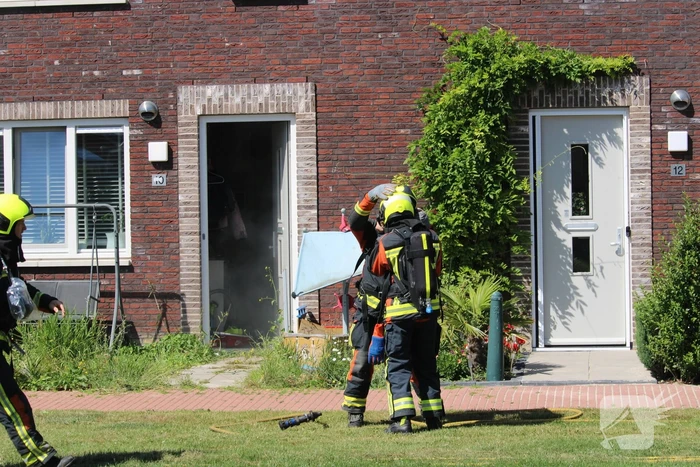 Veel rook bij brand in woning