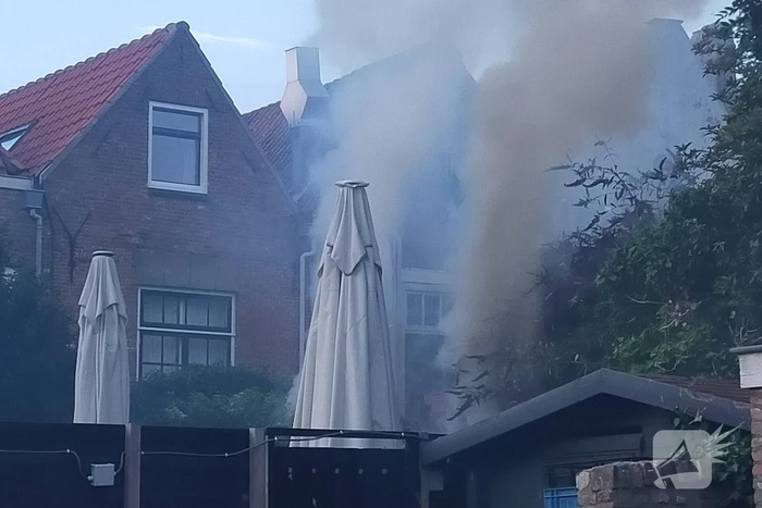 Brand in bosschage bij stadswoning