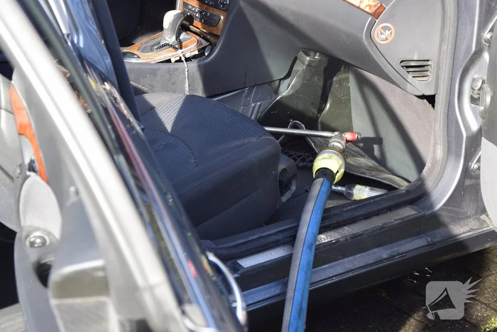 Lastige brand in personenauto