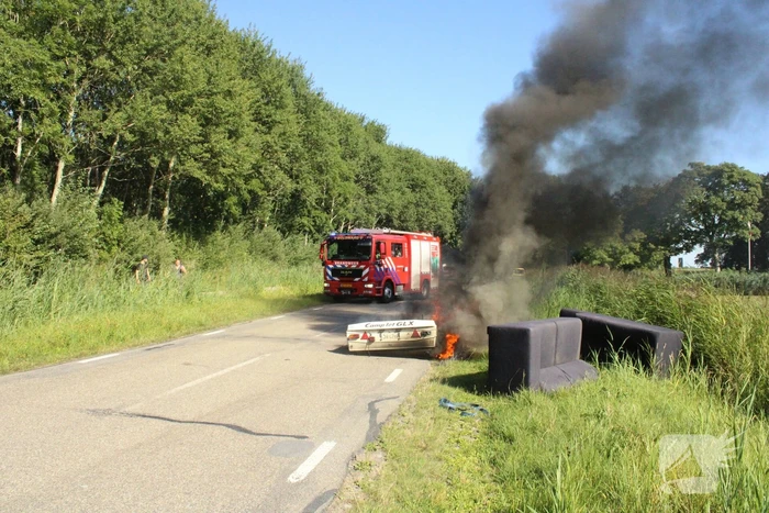 Vouwwagen vat vlam tijdens rijden