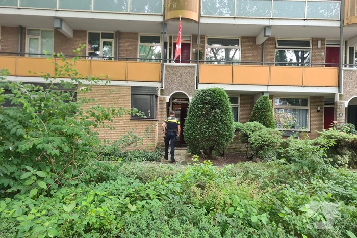 Brand in keuken van flatwoning