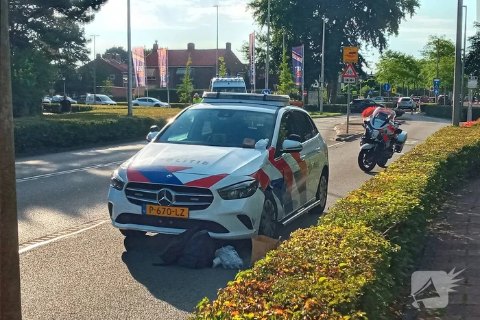 Motoragent botst op politiewagen