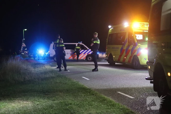 Twee gewonden bij auto te water