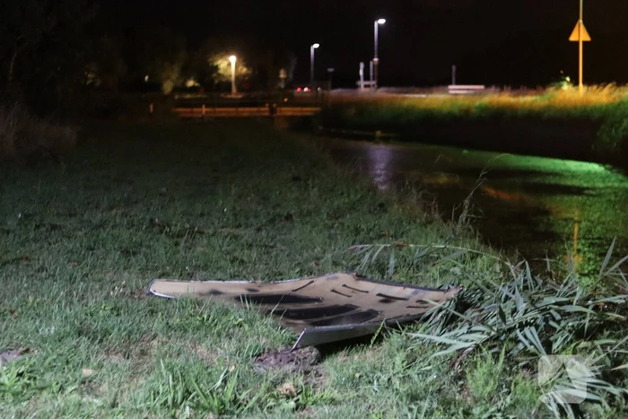 Twee gewonden bij auto te water
