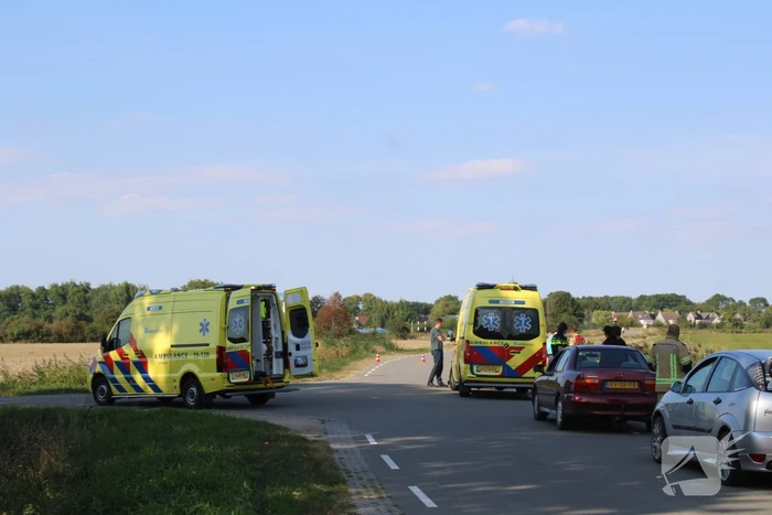 Scootmobiel en racefietser botsen op elkaar
