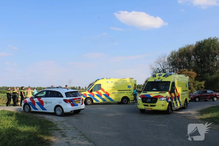 Scootmobiel en racefietser botsen op elkaar