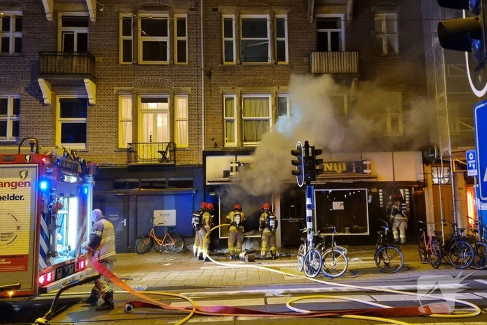 Flinke brand in waterpijpcafé De Nijl