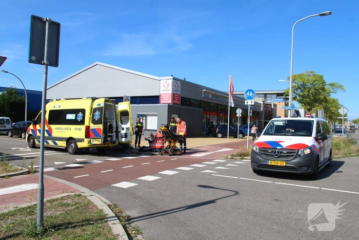 Scooterrijder aangereden door bestelbus
