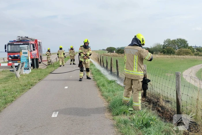 Afrastering beschadigd vanwege brand