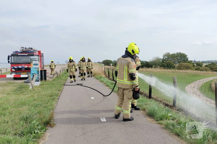 Afrastering beschadigd vanwege brand