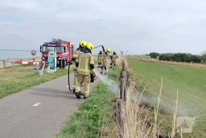 Afrastering beschadigd vanwege brand