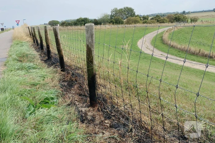 Afrastering beschadigd vanwege brand