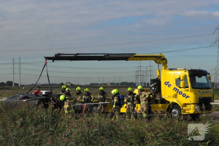 Auto total-loss vanwege brand in motorcompartiment