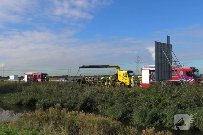 Auto total-loss vanwege brand in motorcompartiment