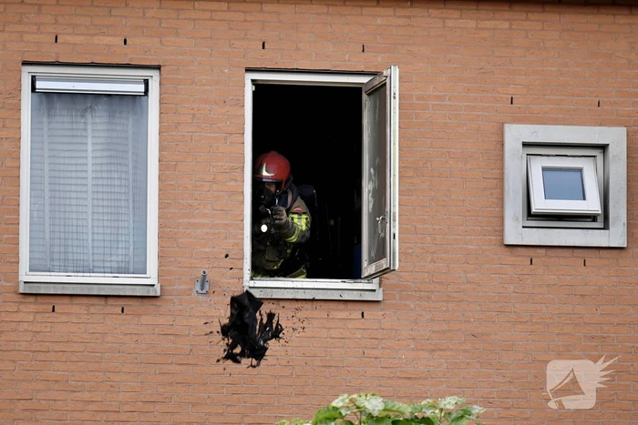 Flinke rookontwikkeling bij brand in woning
