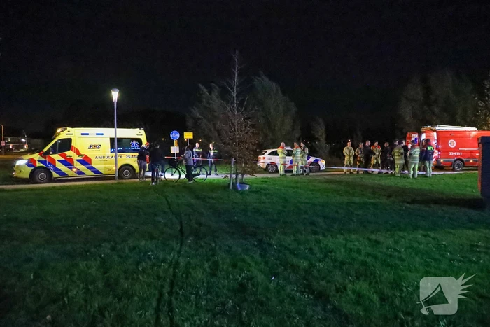 Persoon te water bij Albert Heijn supermarkt