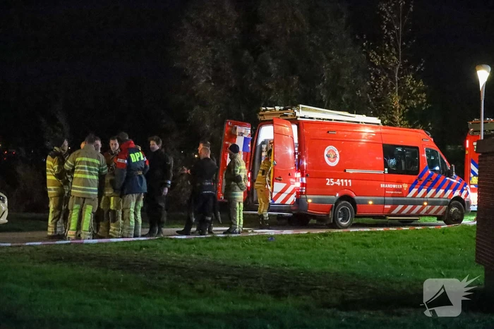 Persoon te water bij Albert Heijn supermarkt