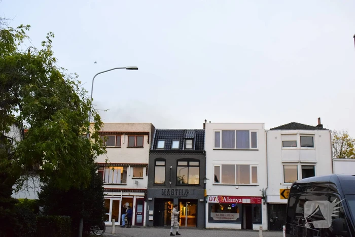 Brand in bijgebouw achter fietsenwinkel