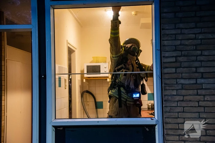 Rookontwikkeling door pannetje op het vuur