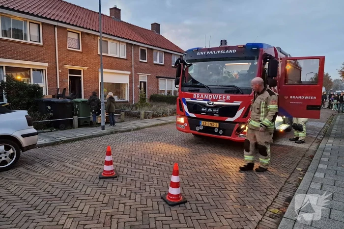 Stuk hout op kachel veroorzaakt brand in woning