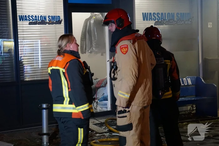 Veel rookontwikkeling bij brand in wasserette