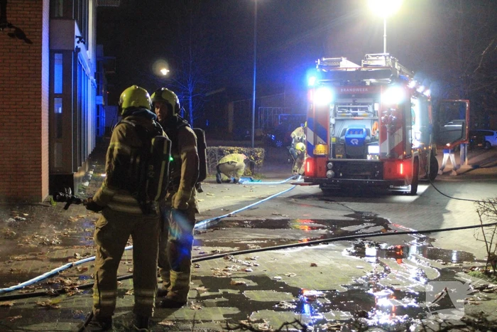 Brand in container tegen pand