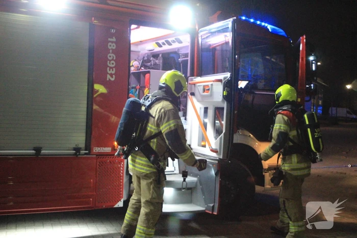 Brand in container tegen pand
