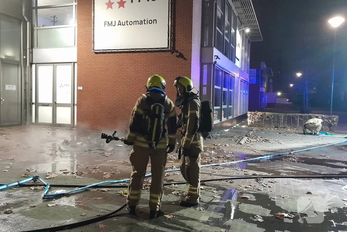 Brand in container tegen pand