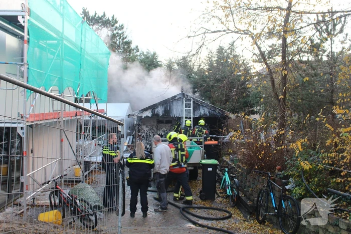 Brand in schuur met houtopslag