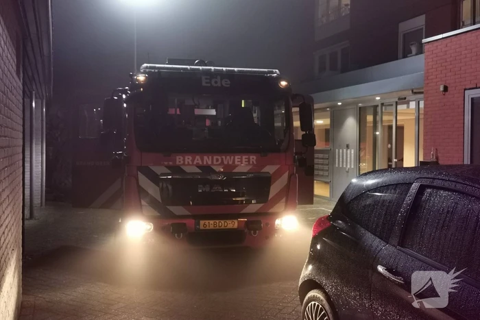 Bewoonster gewond bij woningbrand