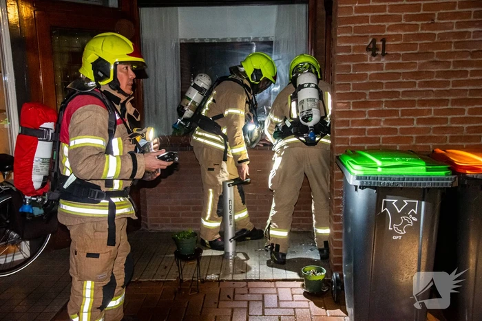 Buurman ontdekt brand in woning van buren