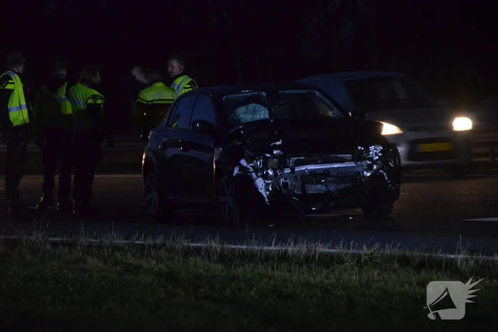 Auto belandt in sloot bij aanrijding in file