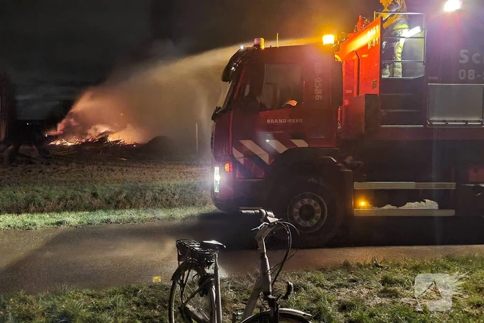 Stapel hout in brand