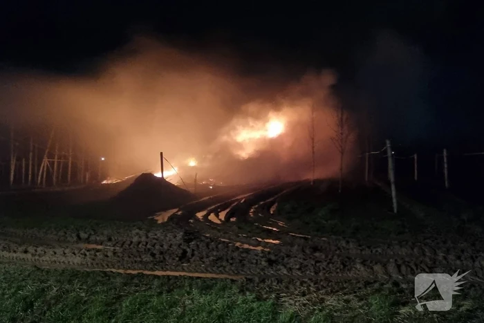Stapel hout in brand