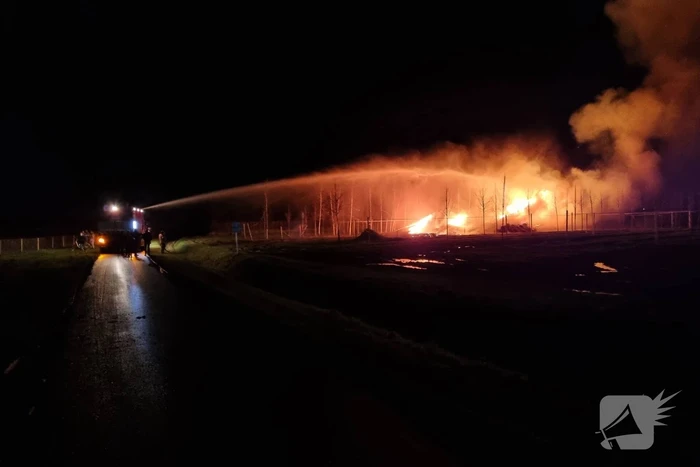 Stapel hout in brand