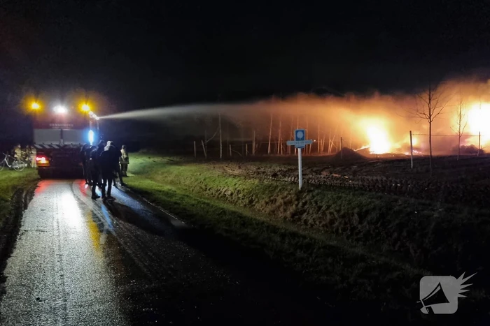 Stapel hout in brand