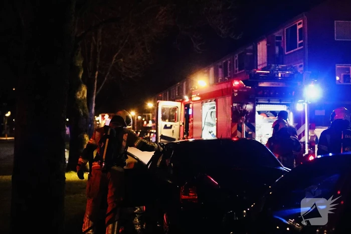 Brand in achterbak van personenauto