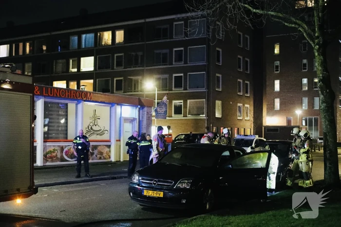 Brand in achterbak van personenauto