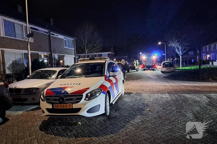 Schutting brandt af tegen overkapping aan