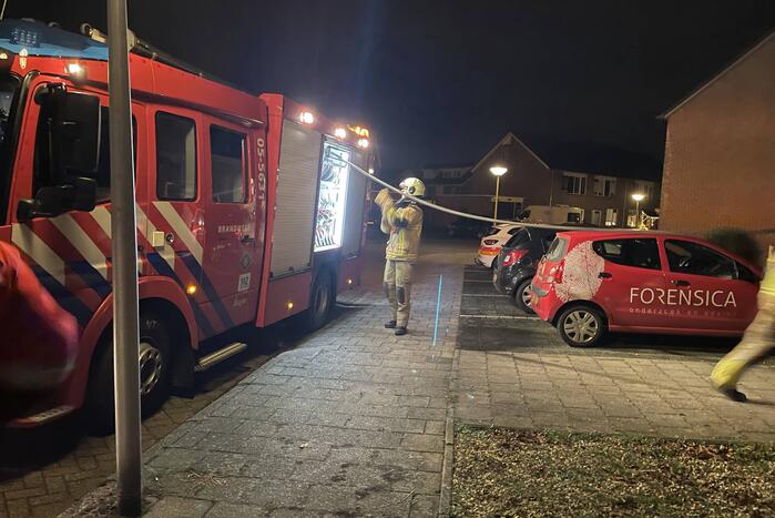 Brandweer blust buitenbrand