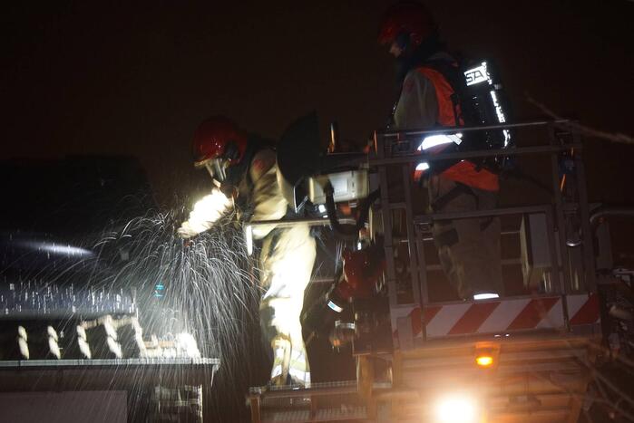 Brand in spouwmuur van woning