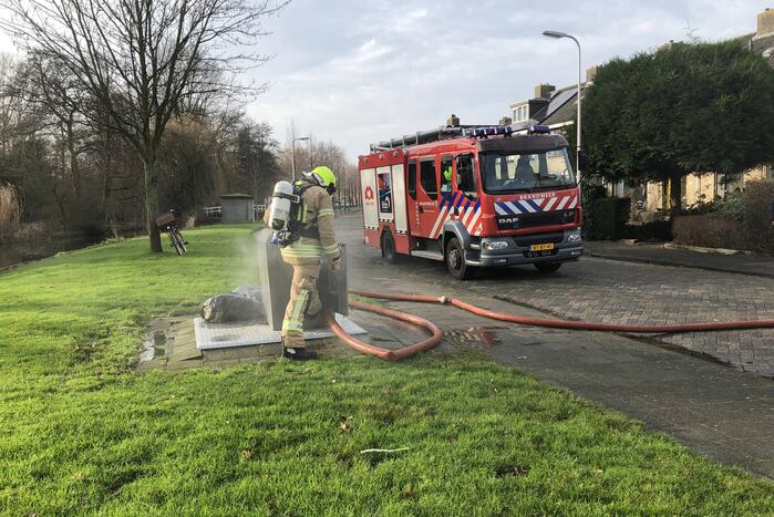 Zak met as zorgt voor containerbrand